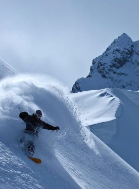 Dropping In. Big Mountain, Bella Coola Heli Sports, BC, Canada