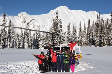 Helicopter & Skier - Copyright: Mike Wiegele Helicopter Skiing